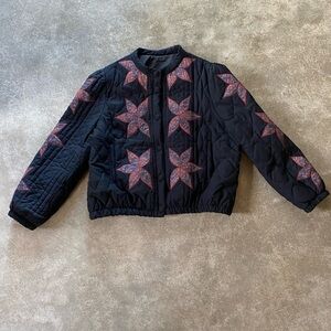 Black Quilted Bomber Style Jacket with Red Star Pattern